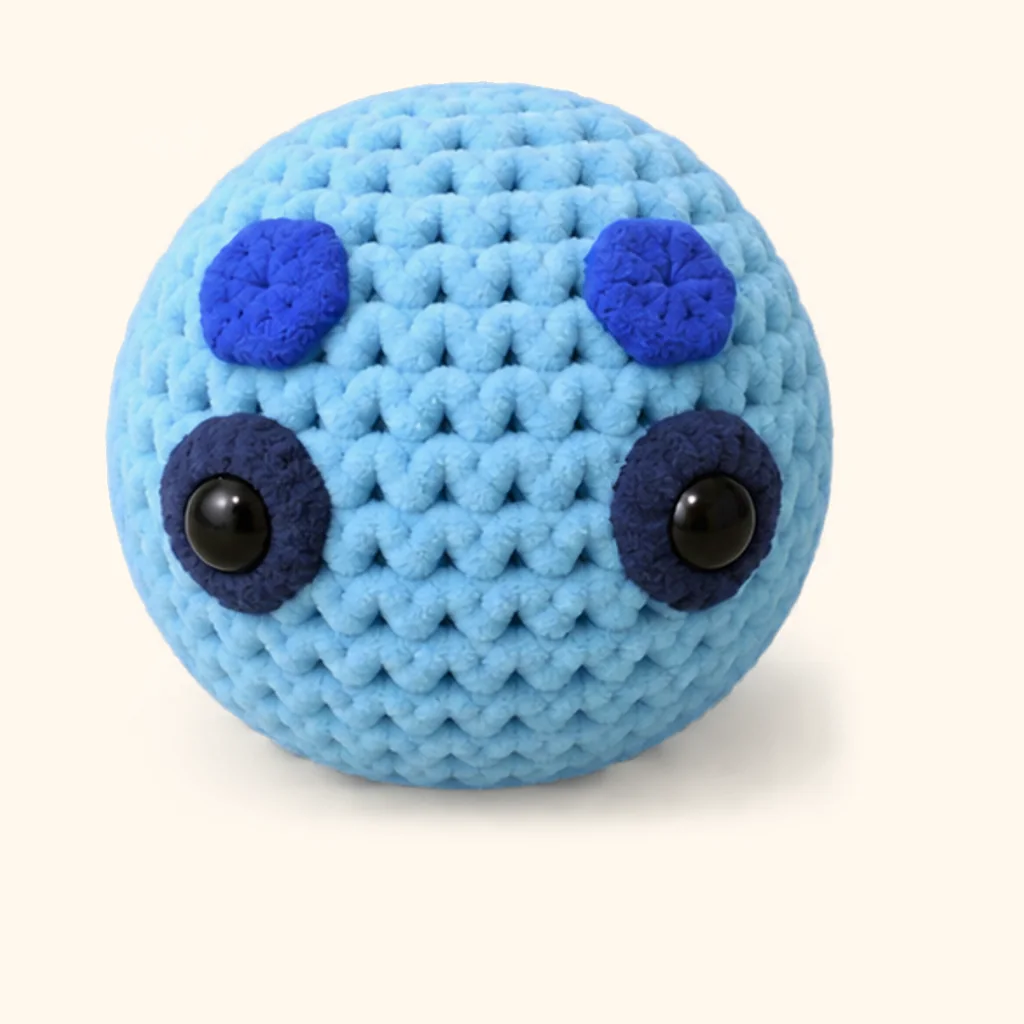 Blueberry turtle crochet assembly: attach the head spots