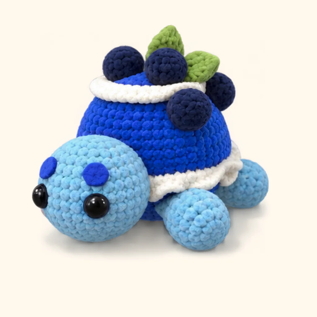 Blueberry turtle crochet assembly: attach the leaf (leaning)