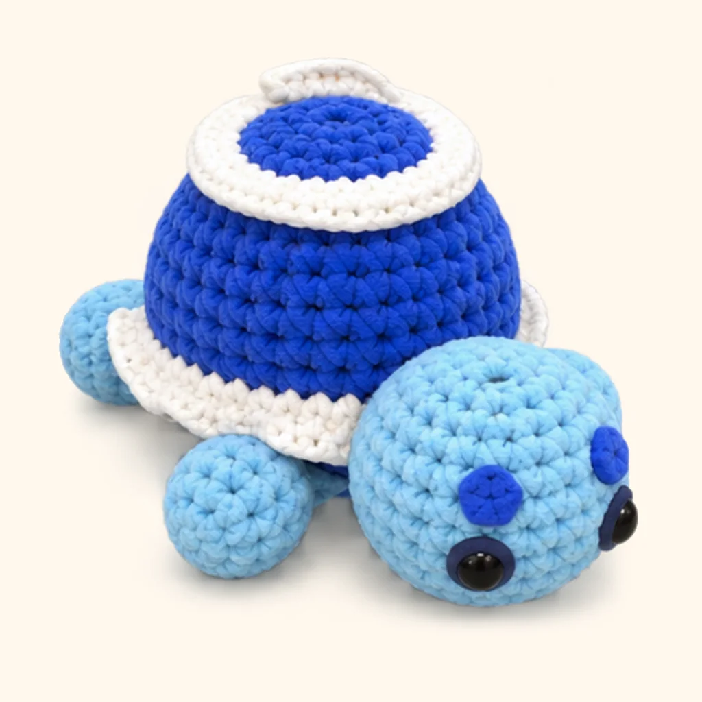 Blueberry turtle crochet assembly: attach the cream swirl