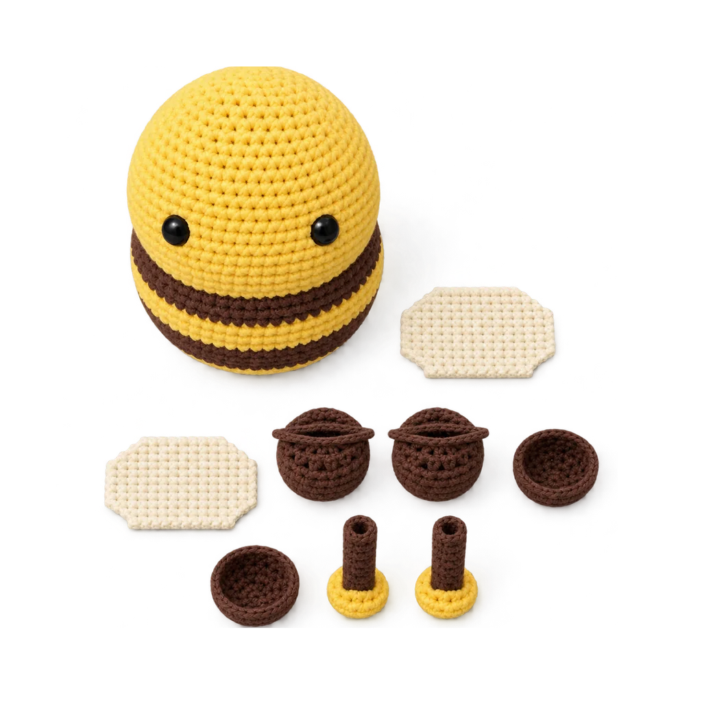 The crocheted pieces of an amigurumi bumblebee, laid out before sewing