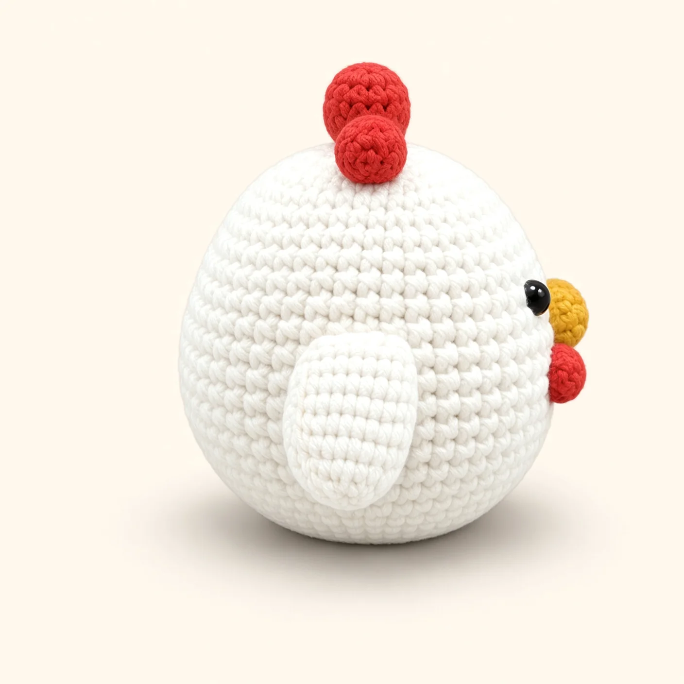 Chicken crochet assembly: attach the wings
