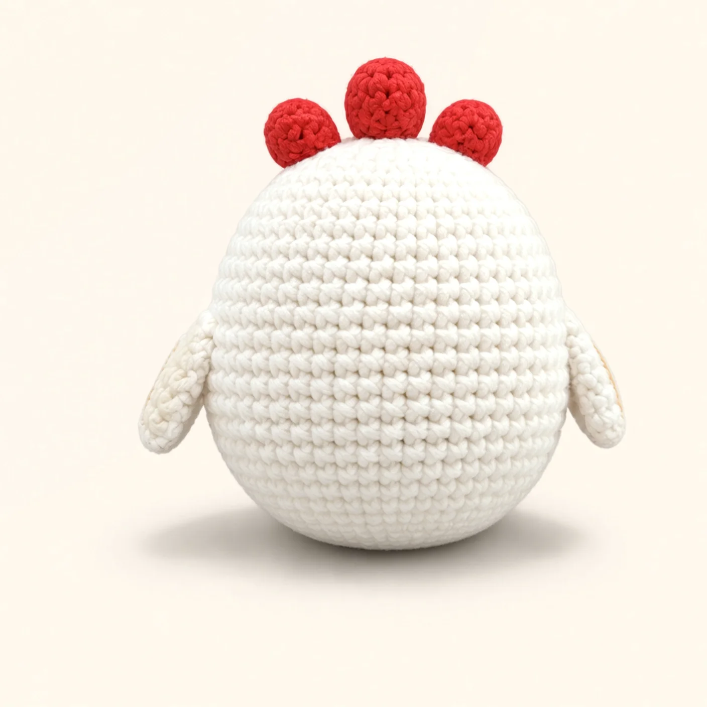 Chicken crochet assembly: sew the wing feather line, back