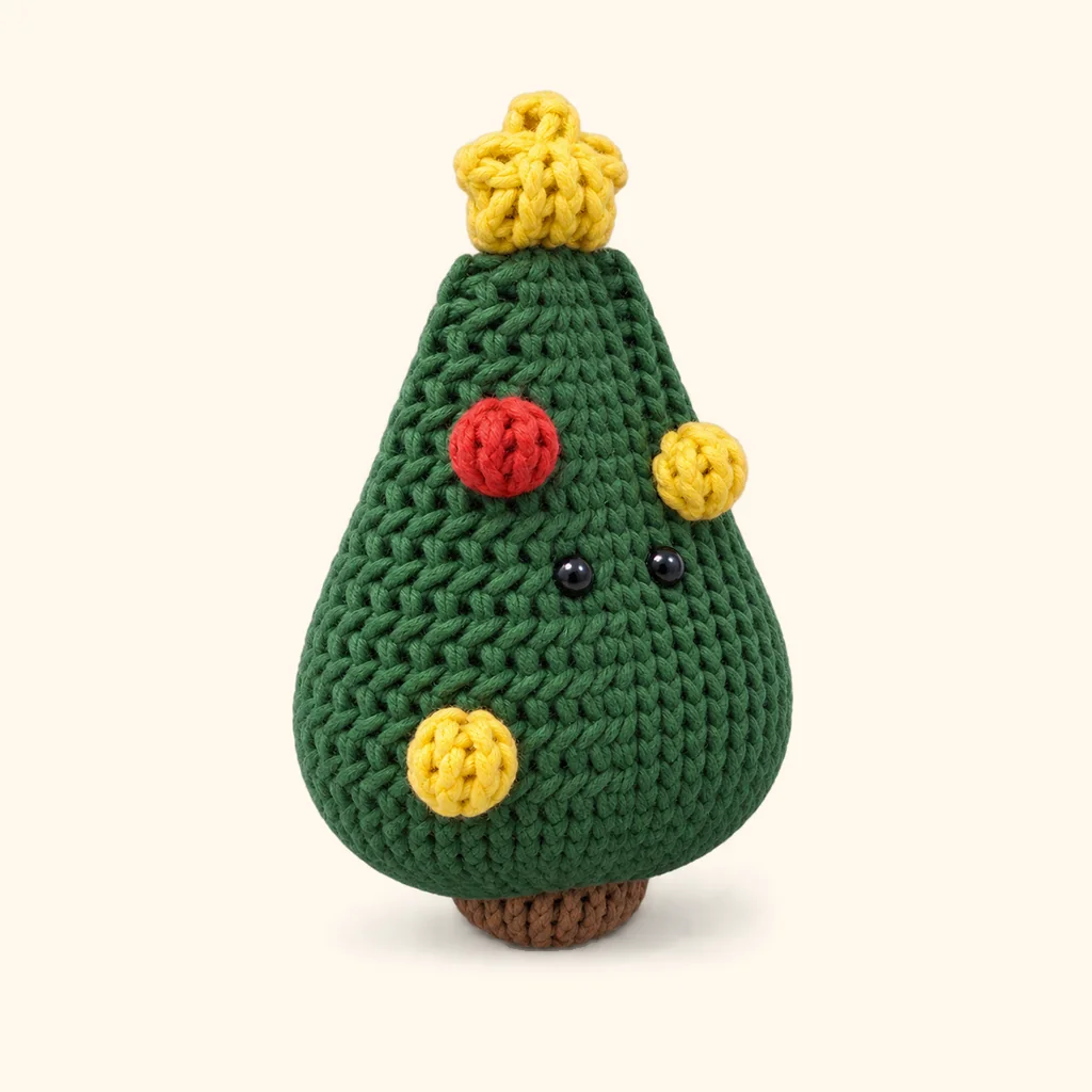 Christmas tree crochet assembly: attach the yellow bauble (lower)