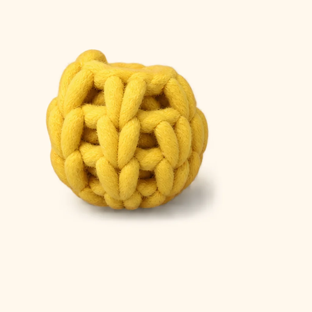 Christmas tree amigurumi: the finished yellow bauble (bottom center)