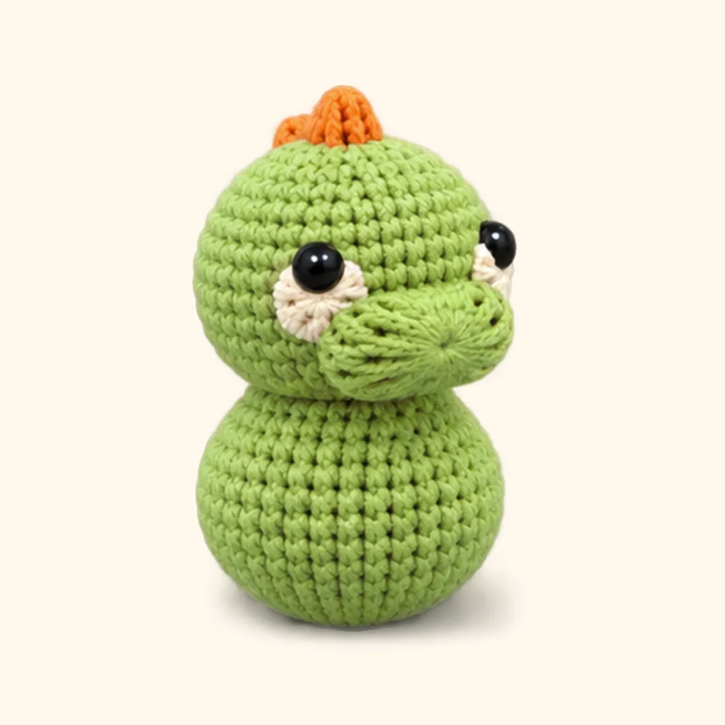 Dinosaur crochet assembly: attach the head