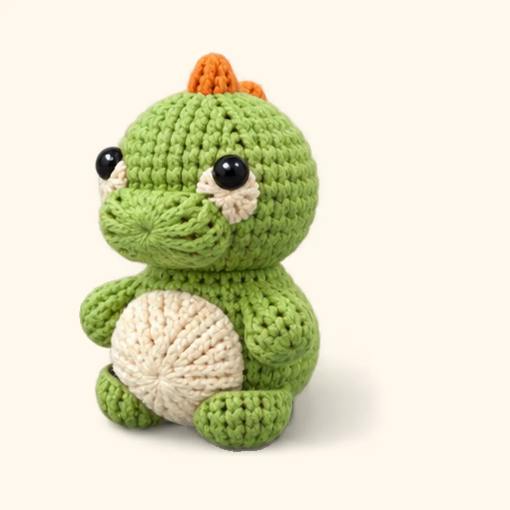 Dinosaur crochet assembly: attach the legs