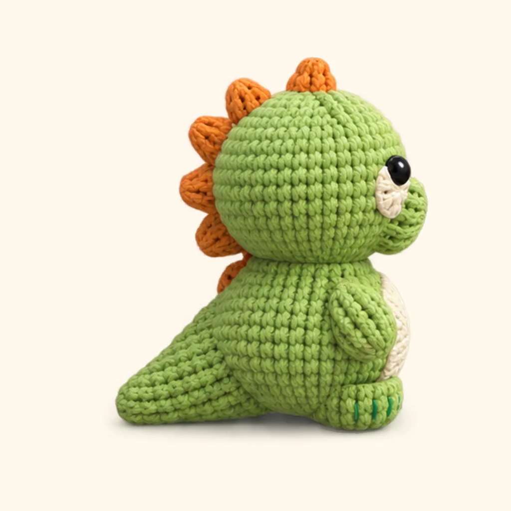 Dinosaur crochet assembly: attach the tail