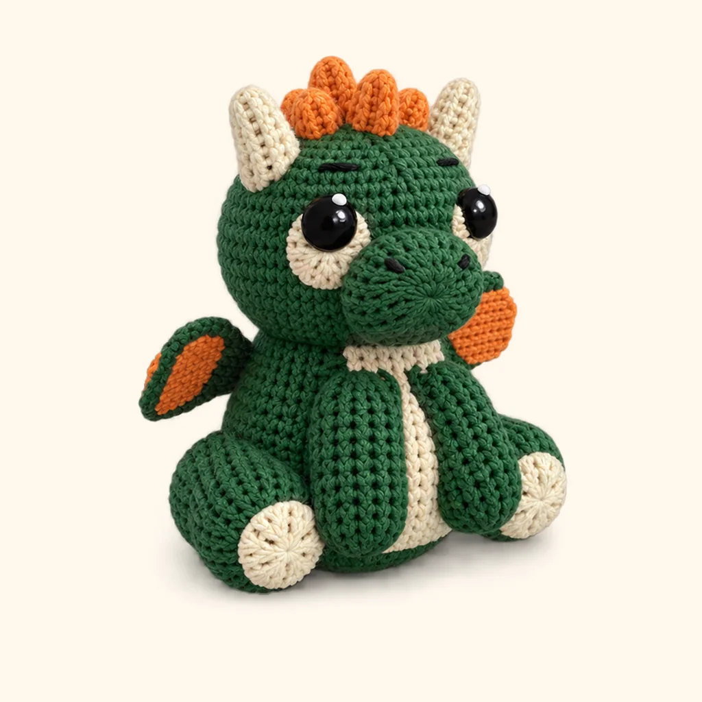 Dragon crochet assembly: sew the eyebrows