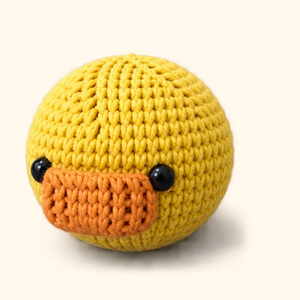 Duck crochet assembly: attach the bill