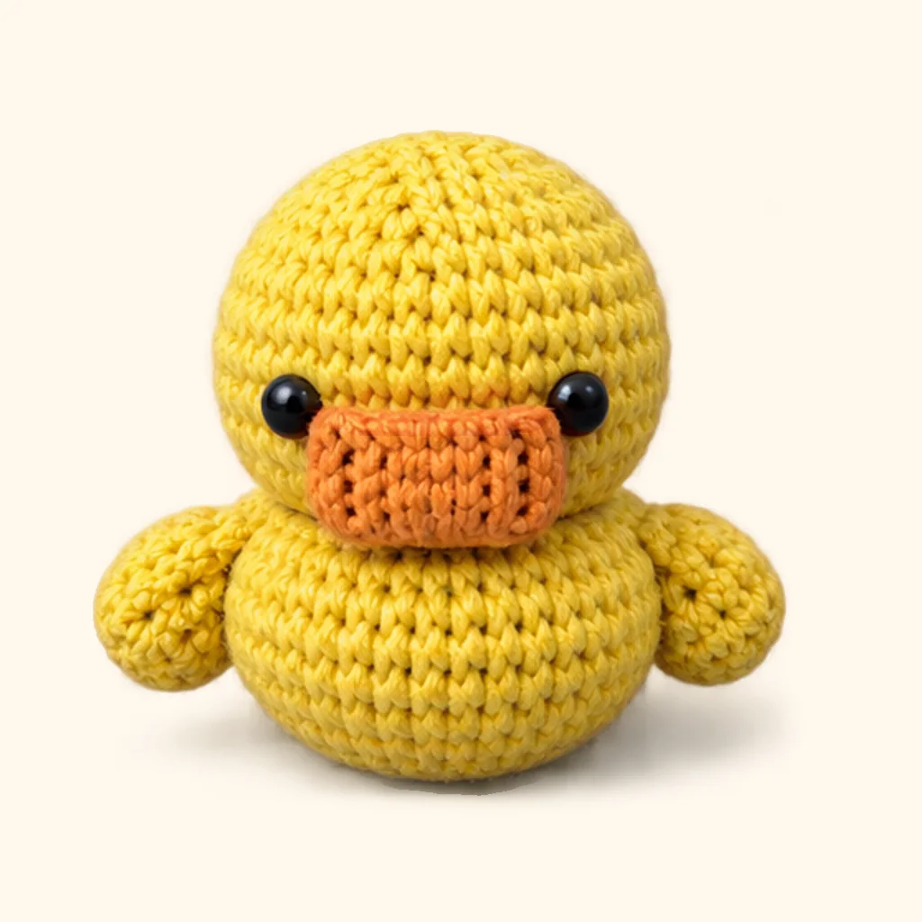 Duck crochet assembly: attach the wings