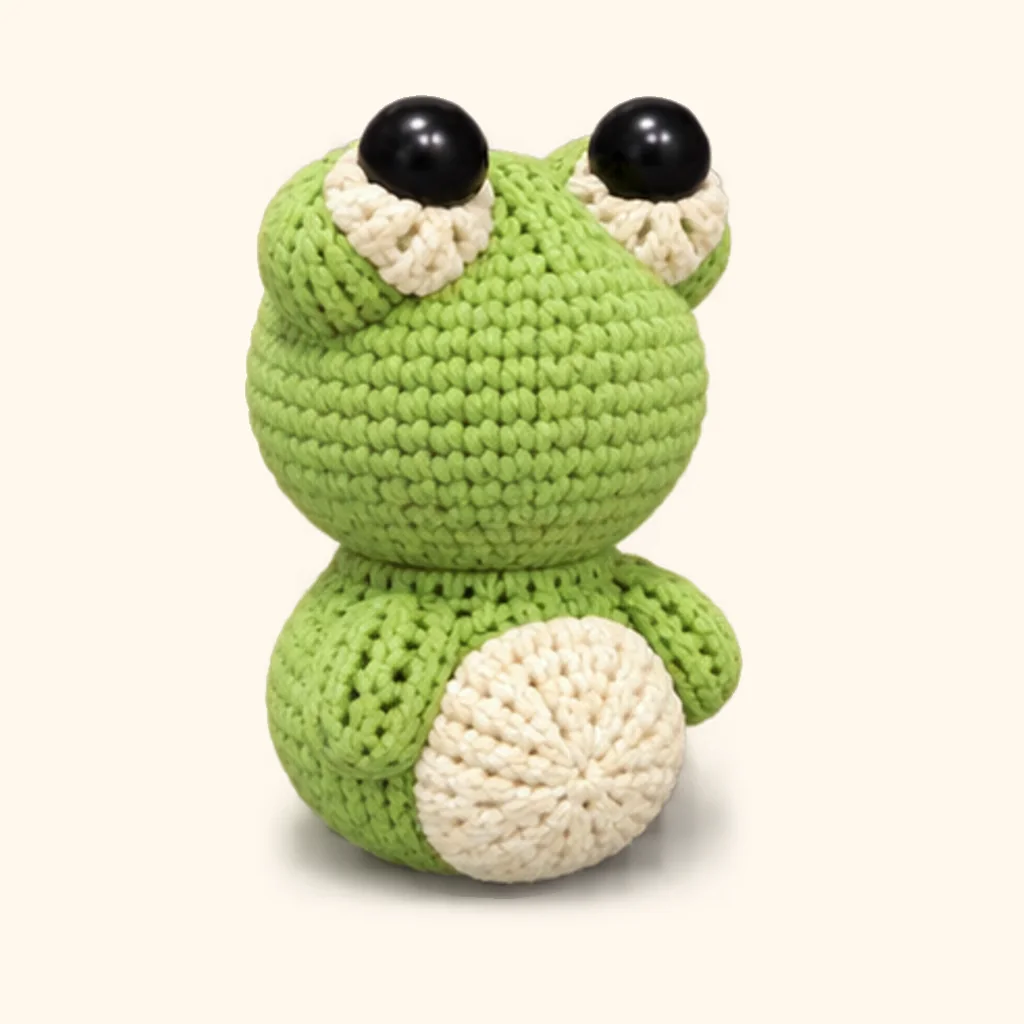 Frog crochet assembly: attach the arms