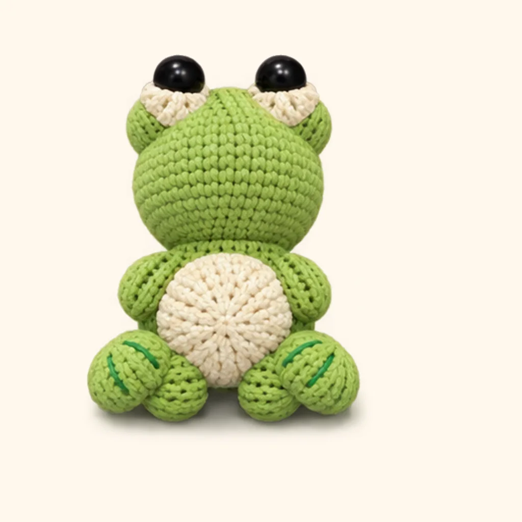 Frog crochet assembly: attach the thighs