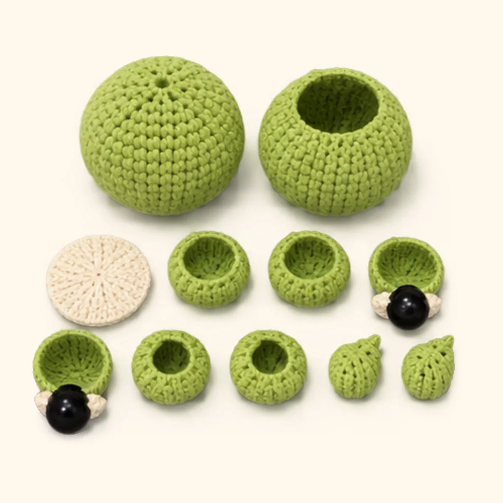 All the crocheted pieces of the Frog amigurumi, laid out