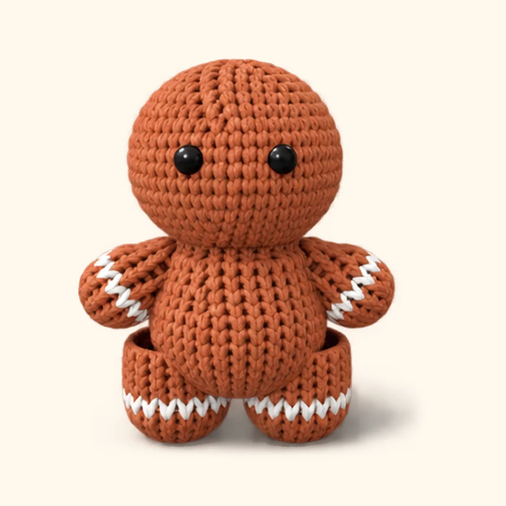 Gingerbread man crochet assembly: attach the arms