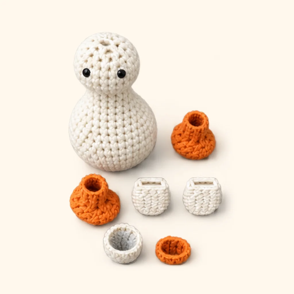 All the crocheted pieces of the Goose amigurumi, laid out