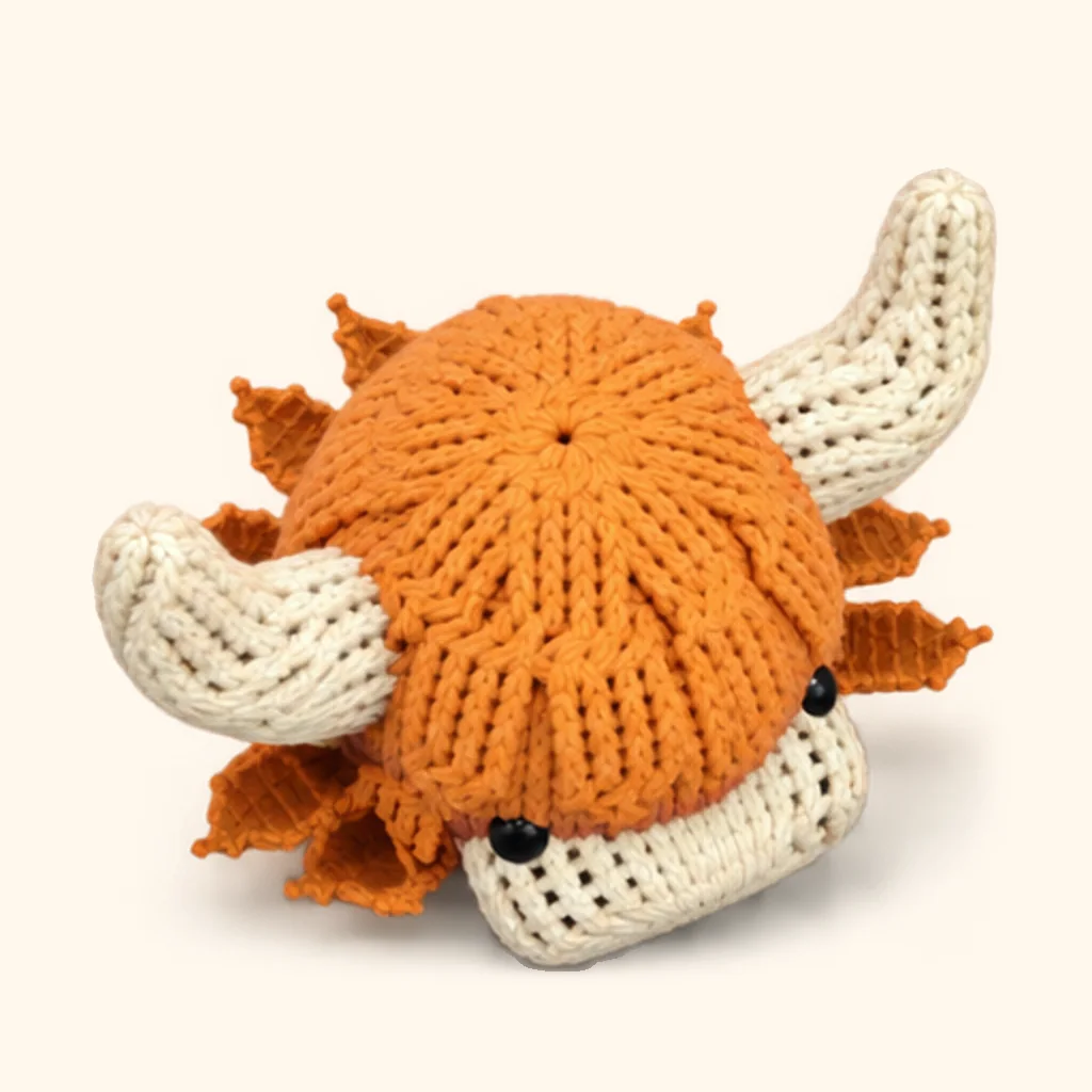 Highland cow crochet assembly: attach the cheek and nape locks