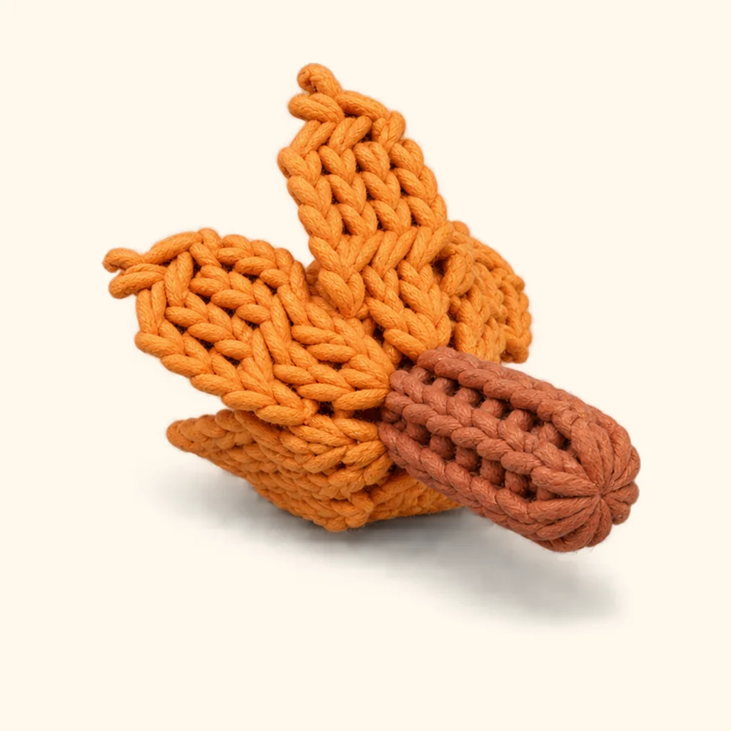 Highland cow crochet assembly: attach the tail tuft locks