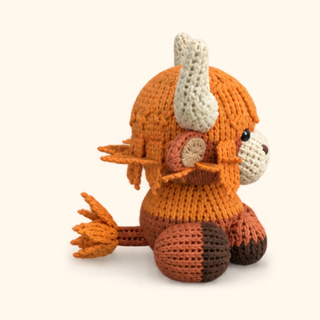 Highland cow crochet assembly: attach the tail