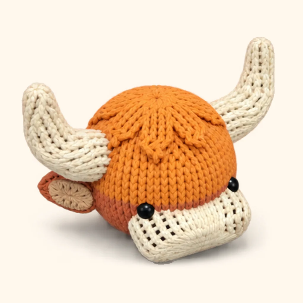 Highland cow crochet assembly: attach the crown locks