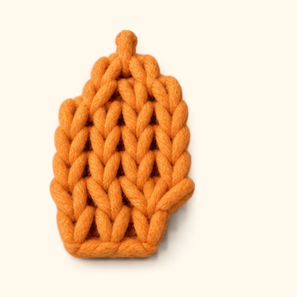 Highland cow amigurumi: the finished tail tuft lock