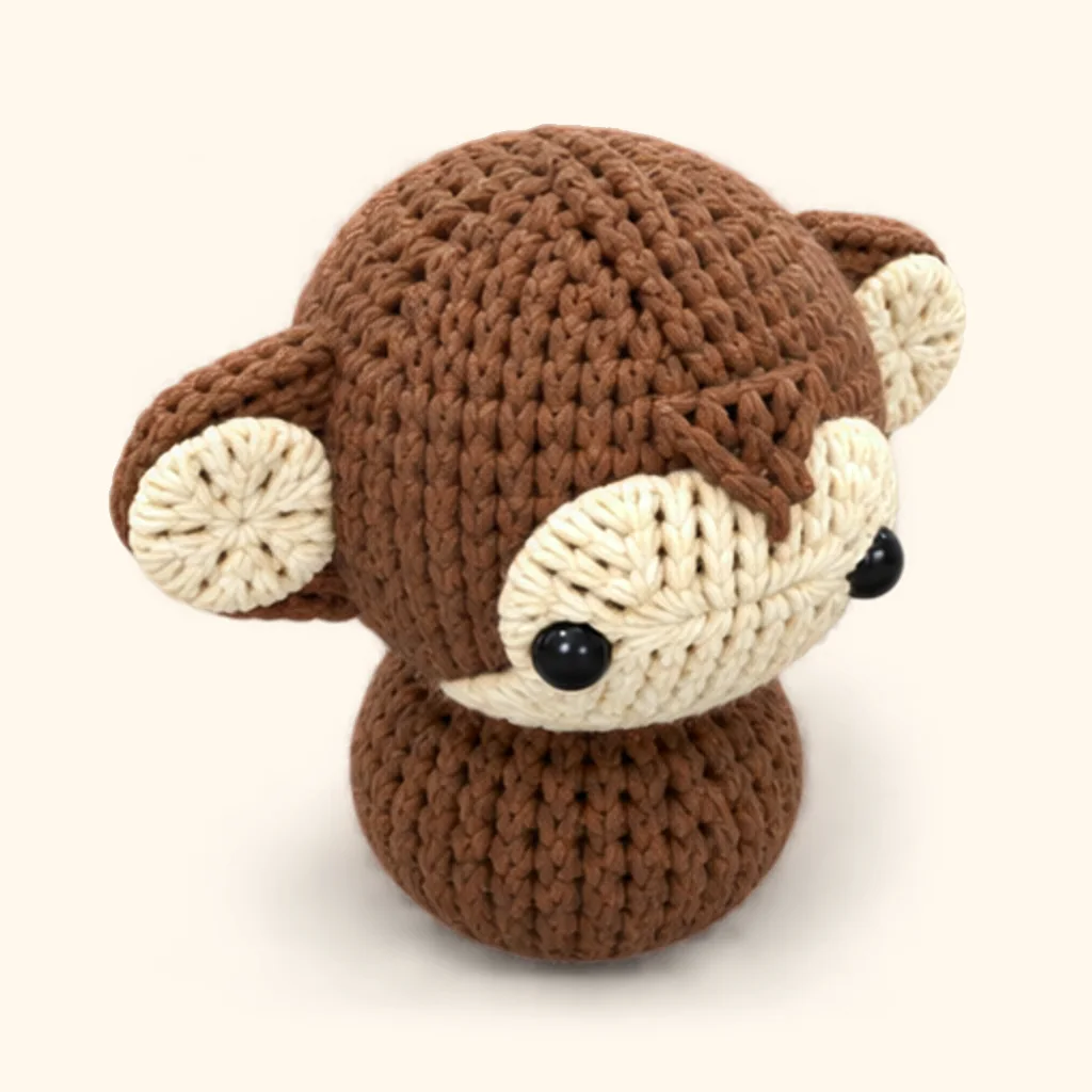 Monkey crochet assembly: attach the head