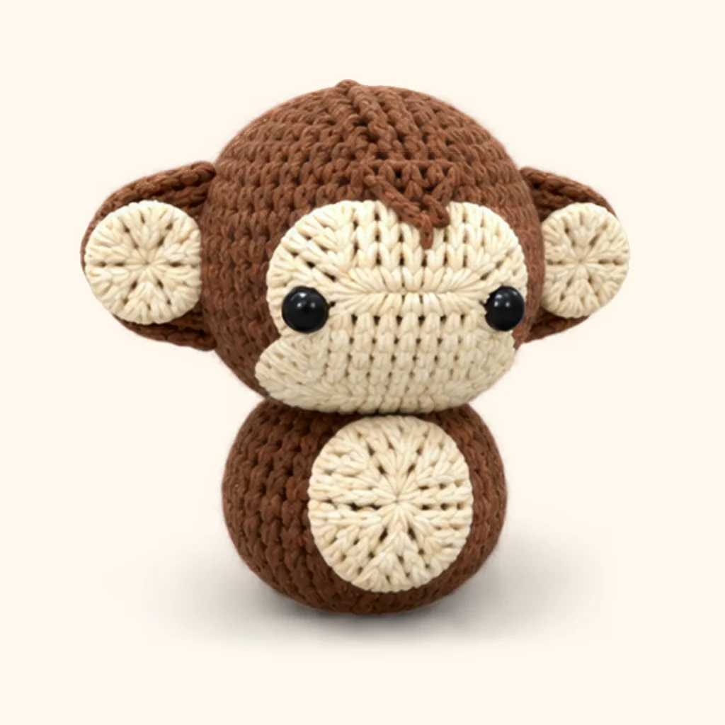Monkey crochet assembly: attach the belly patch