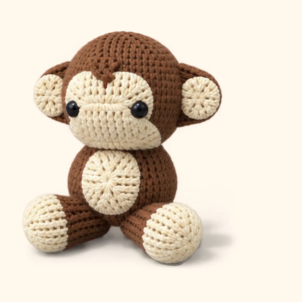 Monkey crochet assembly: attach the legs
