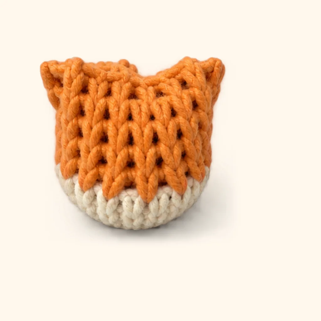 Orange tabby kitten amigurumi: the finished arm