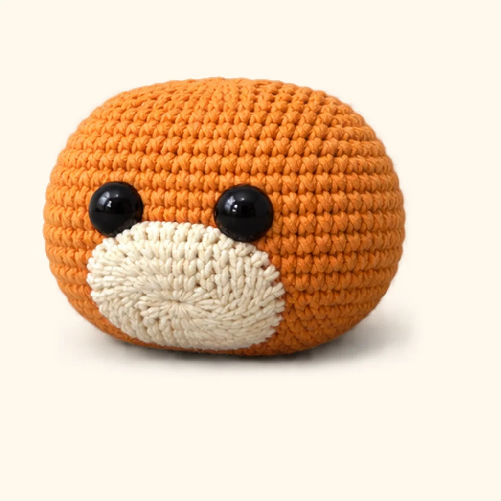 Orange tabby kitten crochet assembly: attach the muzzle