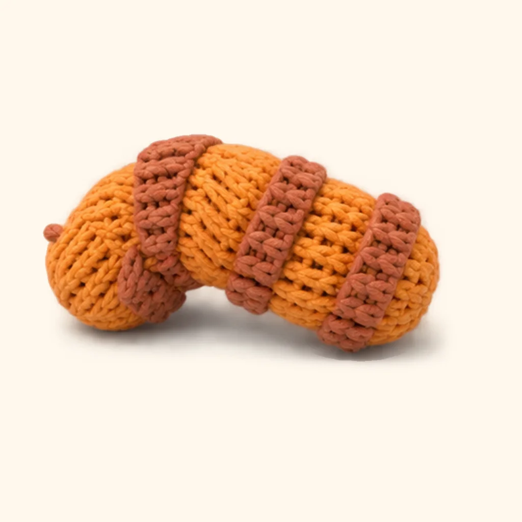 Orange tabby kitten crochet assembly: wrap the tail stripe 4 (nearest the tip)