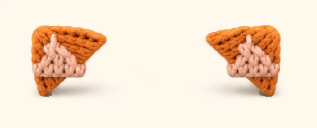 Orange tabby kitten crochet assembly: attach the inner ears