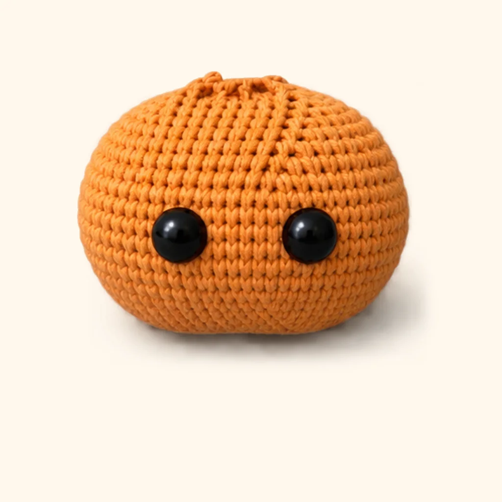Orange tabby kitten amigurumi: the finished head