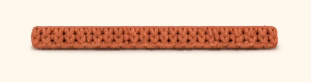 Orange tabby kitten amigurumi: the finished lower back stripe