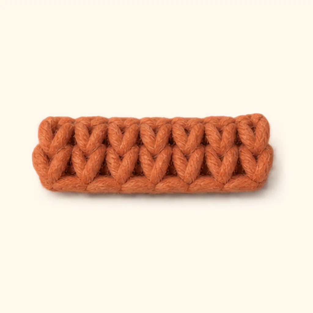 Orange tabby kitten amigurumi: the finished upper cheek stripe