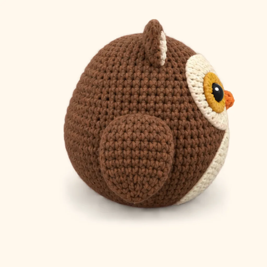 Owl crochet assembly: attach the wings