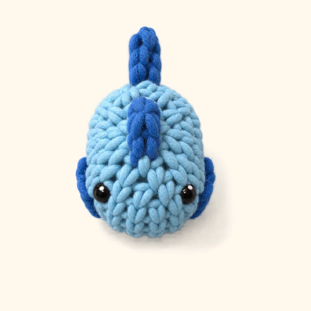 Penguin crochet assembly: sew the fish smile (other side)