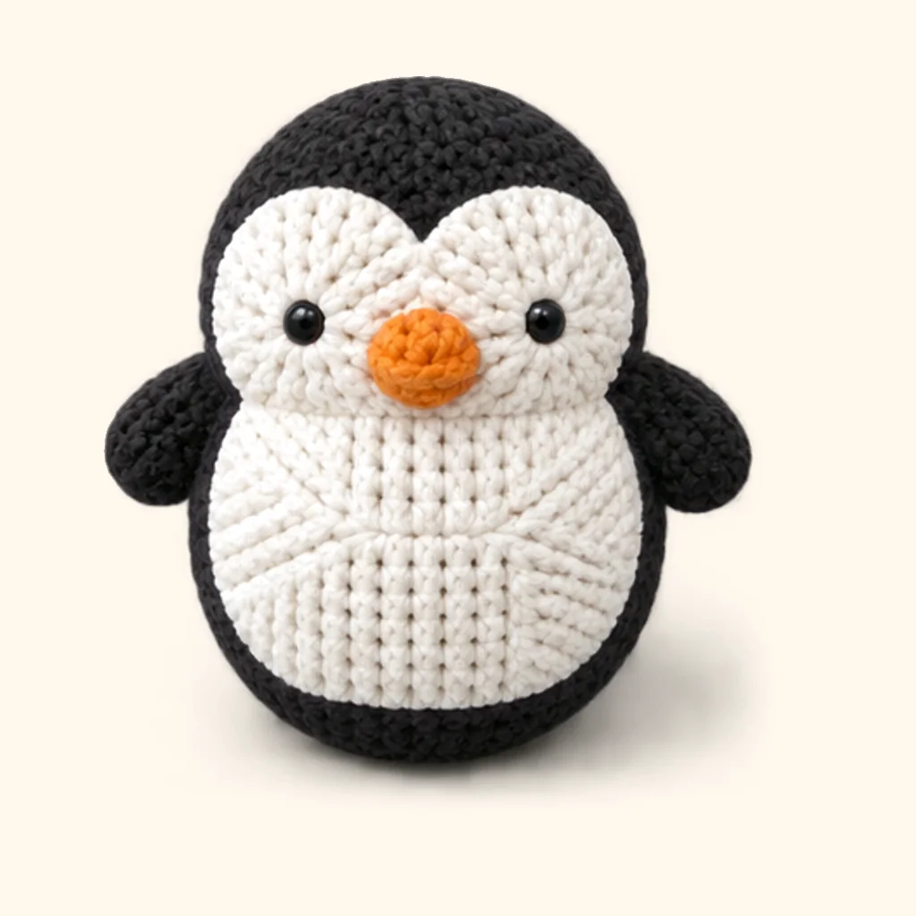 Penguin crochet assembly: attach the flippers