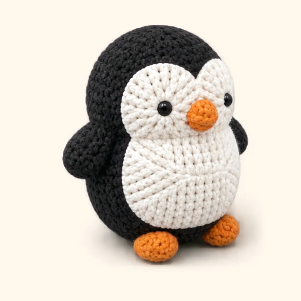 Penguin crochet assembly: attach the feet