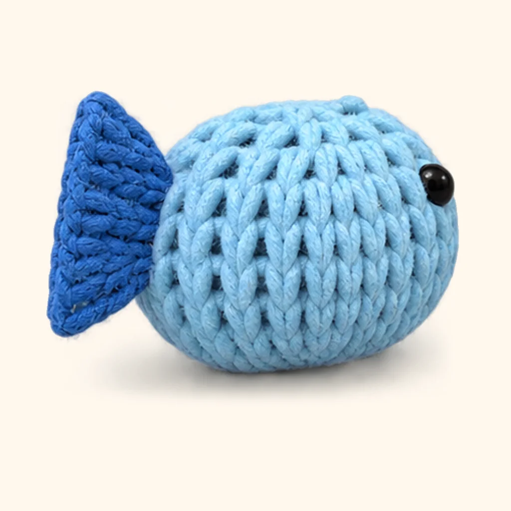 Penguin crochet assembly: attach the fish tail