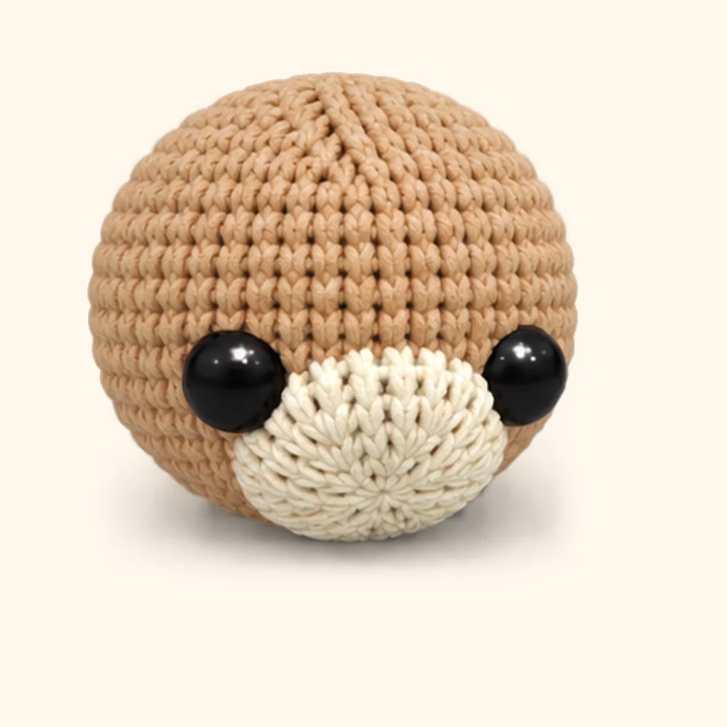 Puppy dog crochet assembly: attach the muzzle