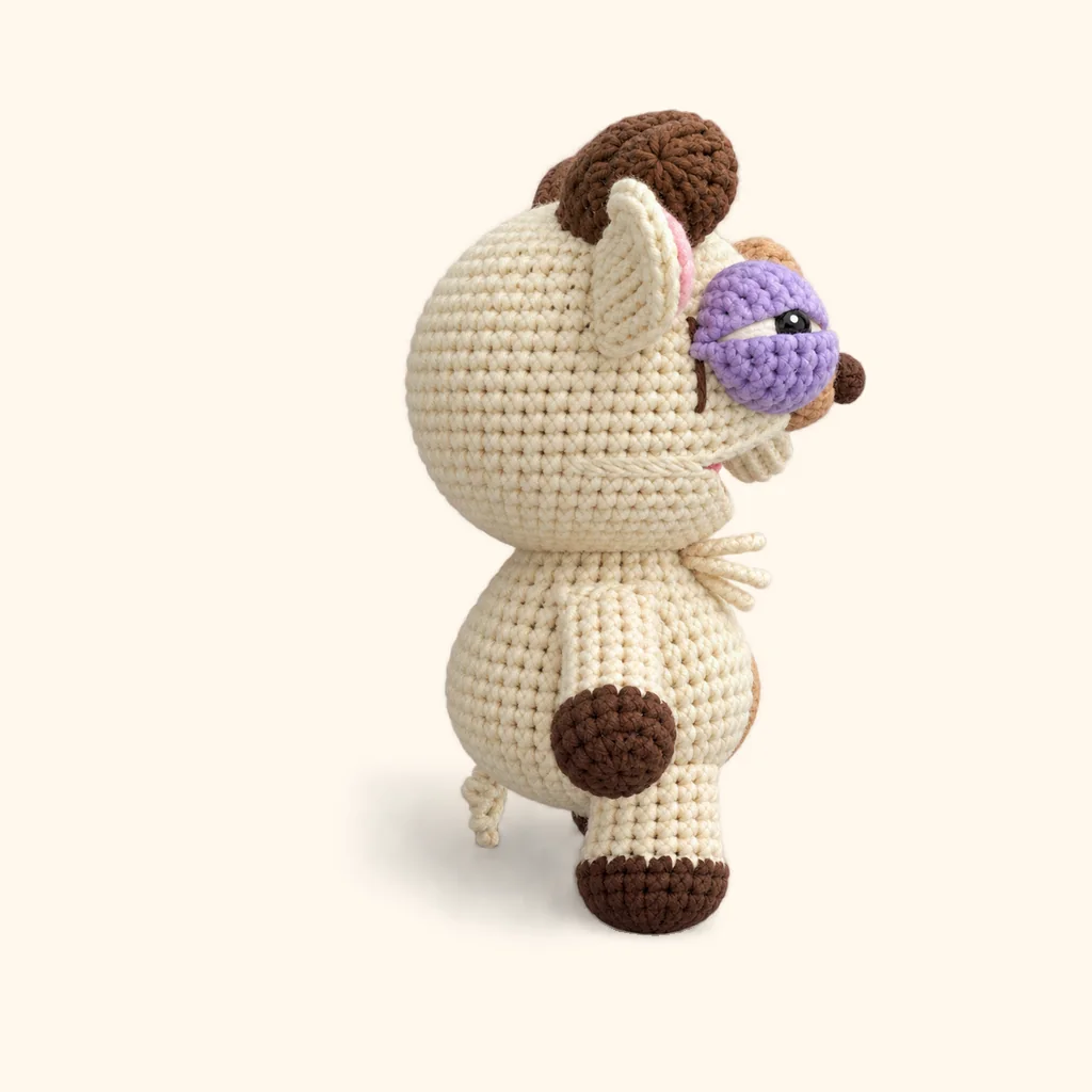 Rogue goat crochet assembly: sew the cheek scar
