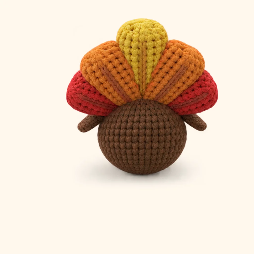Turkey crochet assembly: sew the orange feather crease, front